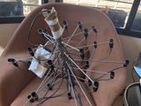 a chair that has a bunch of wires on top of it
