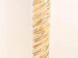 an image of a tall glass candle holder with a spiral design