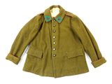 an old coat with a green collar and red trim
