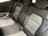 the back seats of a car with two rows of seats in it