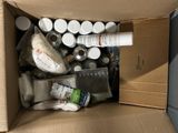 a cardboard box filled with assorted medical supplies