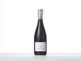 the bottle of wine is sitting on the table with a white background