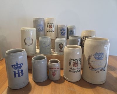 many different types of mugs on the table