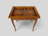 an image of a wooden table with a glass top and two drawers