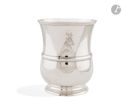 an image of a silver cup with a horse on it