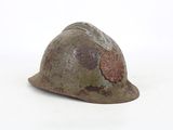 a helmet that is sitting on a white surface