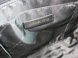a close up of a bag with a zipper on it