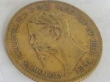 an image of a gold coin with a woman ' s face on it
