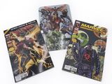 three comic books on a white surface with a white background