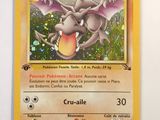 the pokemon card has a picture of a dragon on it ' s back