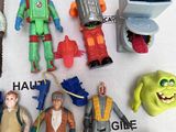 a lot of action figures that are on the table