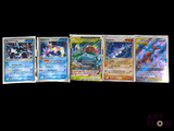 several pokemon cards are lined up in a row on a black background