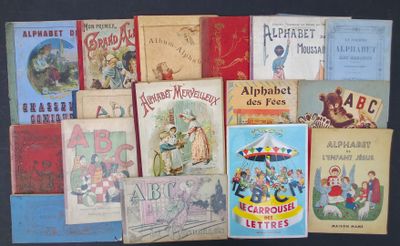 several children ' s books are lined up on a black surface