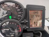 a close up of a motorcycle ' s speedometer and gauges