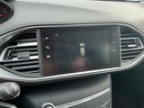 a car dashboard with a digital display in the center