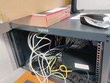 a box with wires and a mouse on top of it