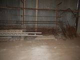 a room that has a bunch of metal bars on the floor