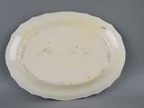 an image of a white plate sitting on top of a table