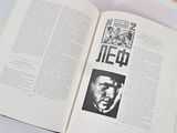 an open book with a picture of a man on it