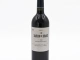 a bottle of wine that is sitting on a table