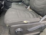 an image of a dirty car with the seat up