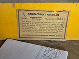 a piece of paper on the ground next to a box