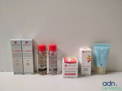 many different types of skin care products displayed on a table