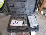 a tool case with tools in it on the ground