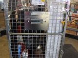 a large metal cage with a bunch of items inside of it