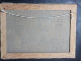 an old picture frame with a rope hanging from it ' s side