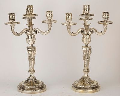 Paire de candélabres en bronze argenté 3 branches 4 lumières…