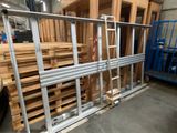 many wooden pallets stacked on top of each other in a warehouse