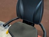 a black office chair that is sitting on the floor