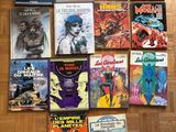 a lot of comic books on the floor on the floor