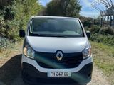 a white van that is parked on the side of the road