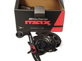 a close up of a box with a fishing reel in it