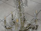 a chandelier that is sitting on the floor in the room