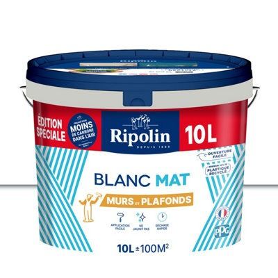 a close up of a bucket of paint on a white surface