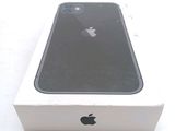 an apple iphone is sitting in a box on a white surface