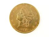 l'image d'une pièce d'or sur laquelle figure une tête de femme