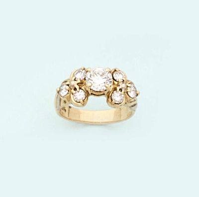 a close up of a diamond ring on a white background
