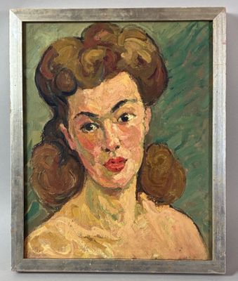 tableau représentant une femme aux cheveux bruns, dans un cadre argenté