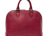 a red louis vuitton bag on a white background