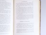 an open book that is sitting on a table