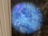 a picture of a painting on the wall of a room