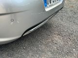 a car that is parked on the side of the road