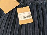 the back of a pair of jeans with a price tag on it