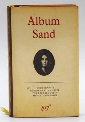 an old book with a picture of a woman on it