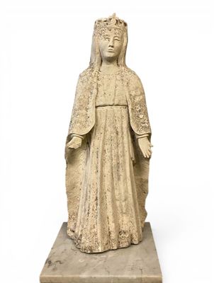 an old statue of a woman wearing a veil and a veiled headdress