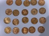 a lot of coins that are on the table